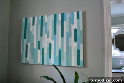 Create a Striking Geometric Canvas Painting: Step-by-Step Guide 5 Initial painted canvas with bold colors