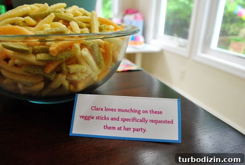 Throwing a Memorable First Birthday Party for Our Daughter 9 Veggie sticks and cookies