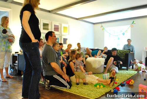 Throwing a Memorable First Birthday Party for Our Daughter 18 Clara's gifts and family