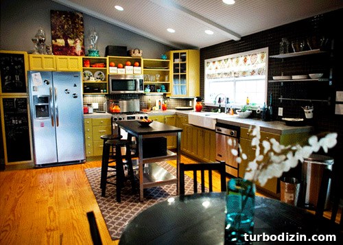 Sleek & Joyful Home Tour: Modern Design Ideas and Inspiration 2 Kitchen view with painted cabinets and concrete counters