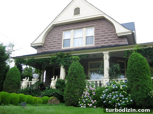 Where to Shop in Bethany Beach: Top Local Stores & Boutiques 22 Garden with gargoyle statues guarding hydrangeas