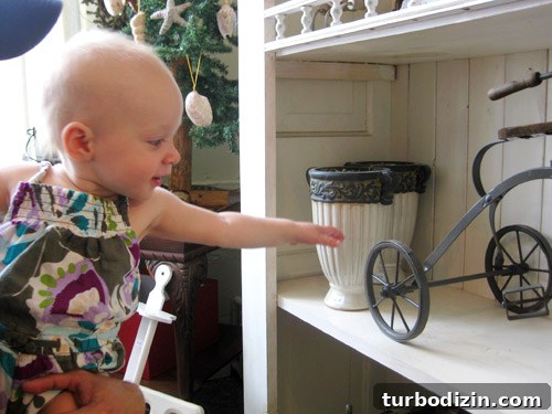 Where to Shop in Bethany Beach: Top Local Stores & Boutiques 4 Little girl looking at metal tricycle in shop