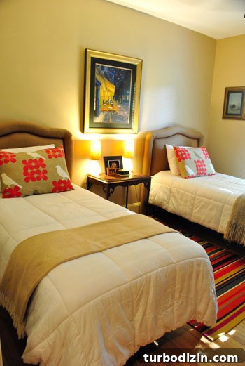 Stunning North Carolina Home Tour: Inside a Charming Southern Residence 13 Guest bedroom with matching headboards