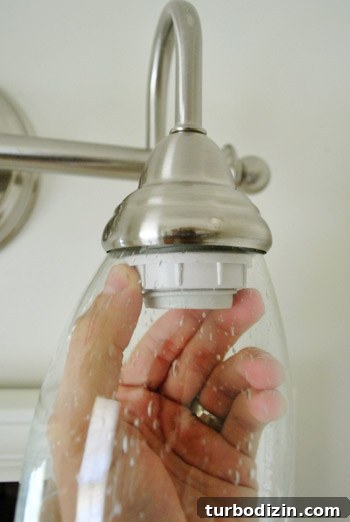 How We Replaced Our Bathroom Light Fixture: Step-by-Step Guide 9 img 37141 8