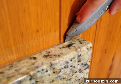 Removing Cabinets and Repairing Vinyl Floor Tile: Step-by-Step Guide 12 img 37273 13