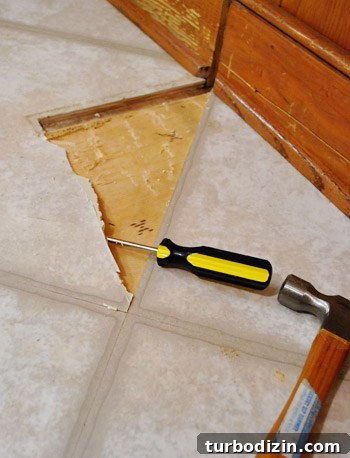 Removing Cabinets and Repairing Vinyl Floor Tile: Step-by-Step Guide 17 img 37273 19