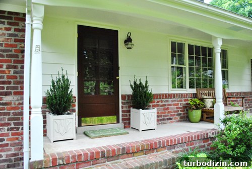 Porch Makeover Ideas to Boost Your Home’s Curb Appeal 11 Evergreen planters