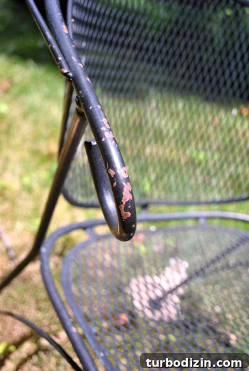 Spray Painting a Metal Outdoor Patio Set: Step-by-Step Guide 9 Close-up of rusted/chipped area before