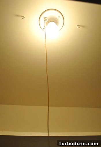 DIY Ribbon Chandelier Tutorial: Step-by-Step Guide for a Stylish Fixture 7 Bare bulb in closet before chandelier