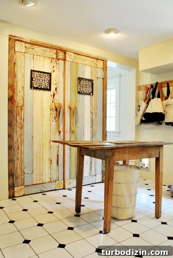 Distressed custom doors hiding washer and dryer