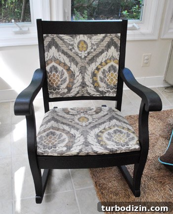 Reupholster a Rocking Chair With Fabric and Nailhead Trim in 7 Steps 11 Sneak peek finished chair