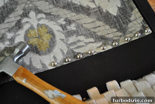 Reupholster a Rocking Chair With Fabric and Nailhead Trim in 7 Steps 13 Evenly spaced nail heads