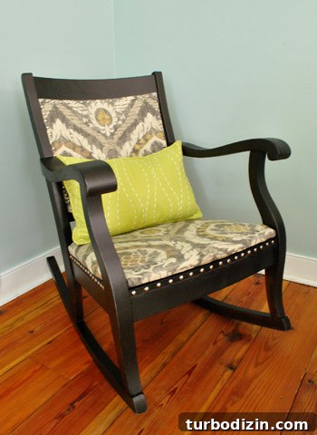 Reupholster a Rocking Chair With Fabric and Nailhead Trim in 7 Steps 18 Rocker with green pillow