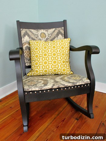 Reupholster a Rocking Chair With Fabric and Nailhead Trim in 7 Steps 19 Rocker with patterned yellow pillow