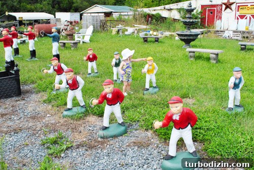 Clara among lawn ornaments