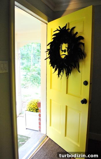 Mailbox Landscaping Ideas to Boost Curb Appeal and Function 11 Black feather wreath on door