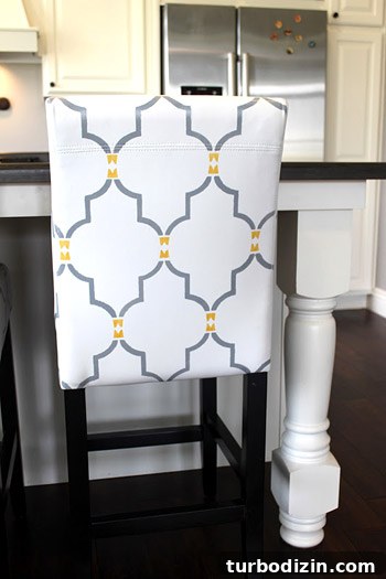 Stencil Fabric Chairs: Step-by-Step Guide to Stylish DIY Upholstery 3 Painted leather bar stool after