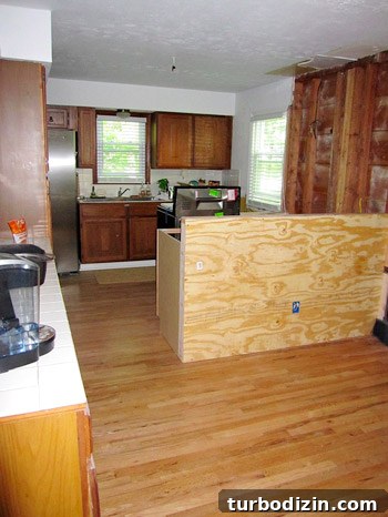 Blue and White DIY Kitchen Remodel: Step-by-Step Guide and Tips 4 DIY breakfast bar made from two pre-made cabinets