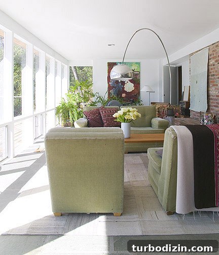 scenic-living-room-windows-vintage-modern Living room with large windows and vintage-modern decor