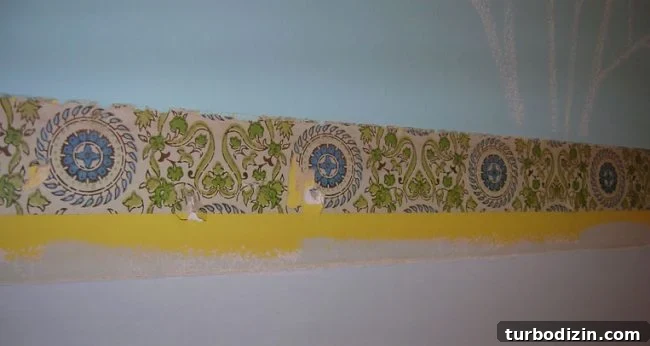 Removing Chair Rail and Demoing a Slate Path: Step-by-Step Guide 2 Yellow paint and 70s wallpaper under chair rail