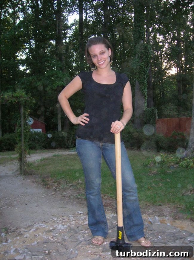 Removing Chair Rail and Demoing a Slate Path: Step-by-Step Guide 4 Sledgehammer smashing slate medallion
