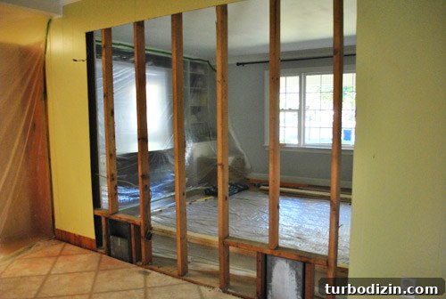 Drywall removed and light entering kitchen