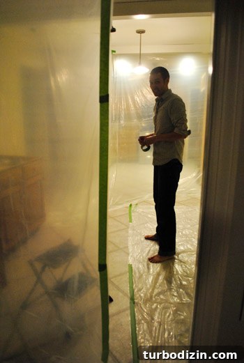 Kitchen Renovation: Protective Hanging Plastic Sheeting Guide 2 Plastic sheeting during wall prep