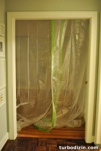 Kitchen Renovation: Protective Hanging Plastic Sheeting Guide 4 Taped plastic doorway
