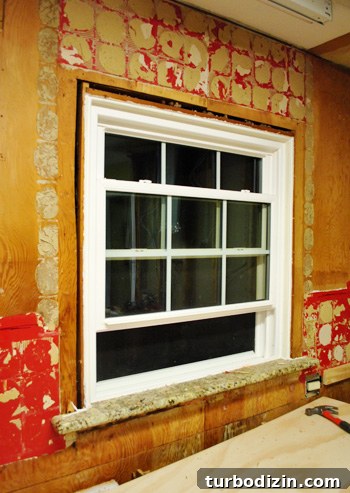 How to Remove Old Backsplash Tile and Plywood Safely 13 Removing window trim