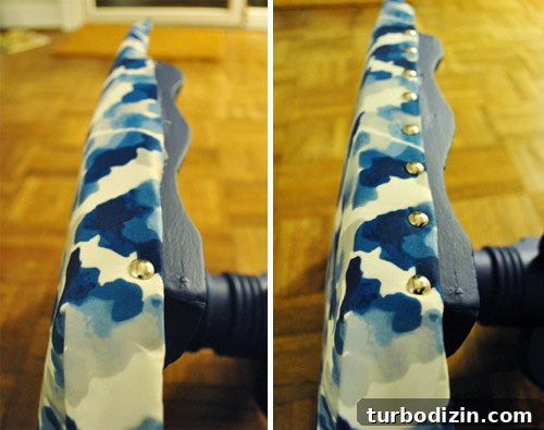 How to Paint and Reupholster a Stool Yourself 6 Decorative nail heads installed
