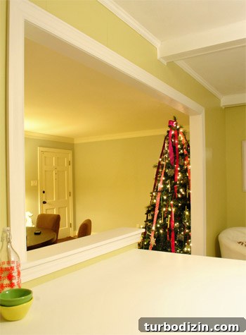 Kid-Friendly Christmas Tree Made from Paint Chips and Ribbons 18 Tree seen from kitchen doorway