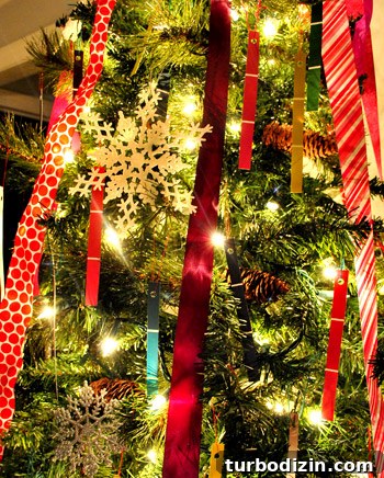 Kid-Friendly Christmas Tree Made from Paint Chips and Ribbons 10 Close-up of colorful paint chip ornaments on tree