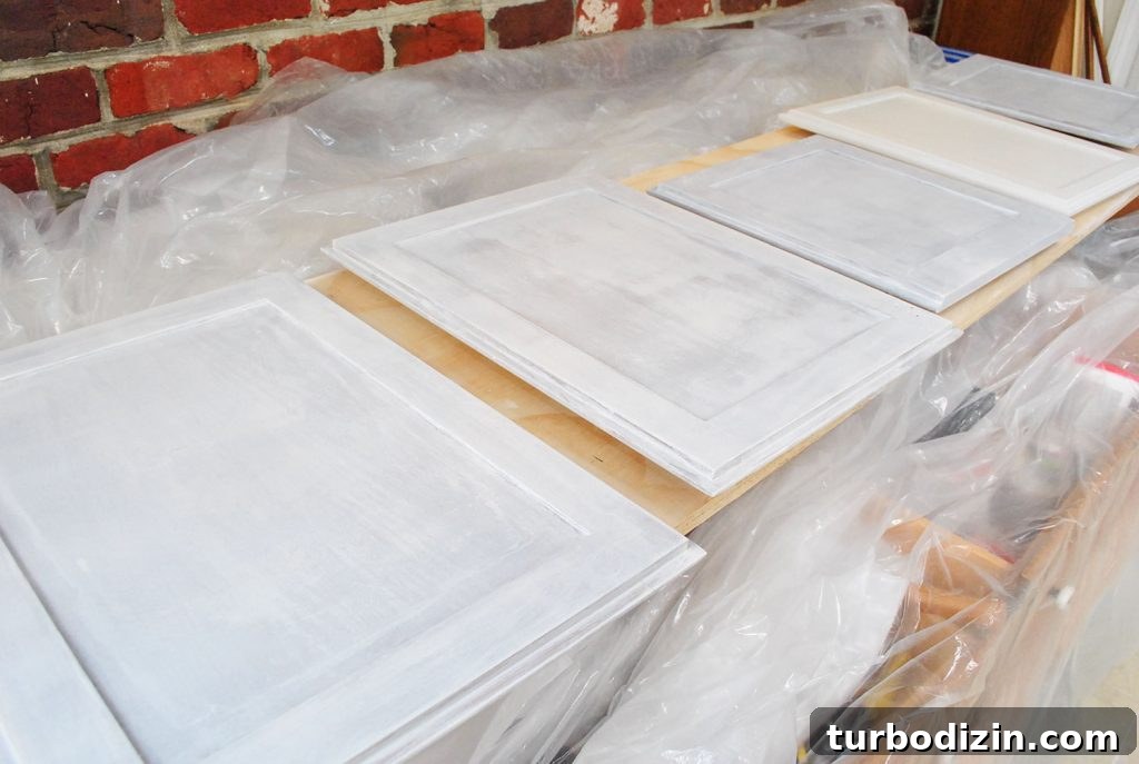 How to Paint Kitchen Cabinets Like a Pro: Step-by-Step Guide 9 Cabinet Door Fronts Coated With Primer