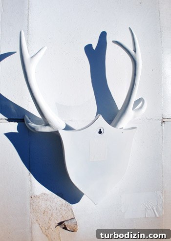 Back of faux deer head being sprayed
