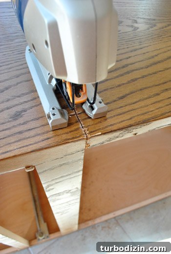 How to Modify a Cabinet for Efficient Tool Storage 10 cutting cabinet with jigsaw