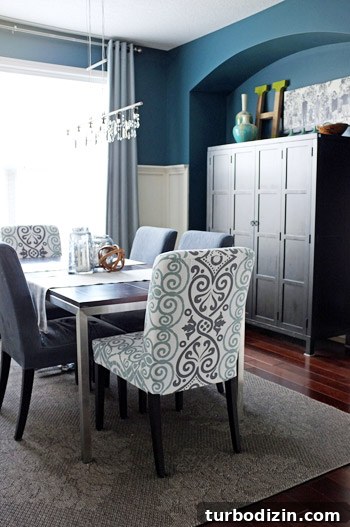 Dining Room with Board and Batten and Deep Blue Walls 5 Close-up of chair fabric
