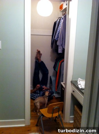 Top January Highlights and Notable Moments 2 Photographer crouched in closet