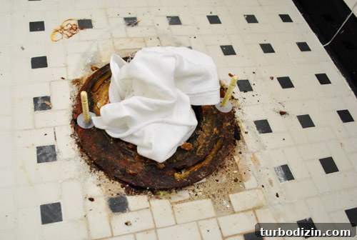 Fix a Wobbly Toilet: Quick Steps to Stabilize It Safely 18 New toilet flange bolts slid into place for new wax ring installation