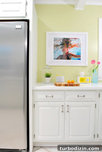 Buying Our First Major Artwork: Tips for New Collectors 6 Spray painting the frame
