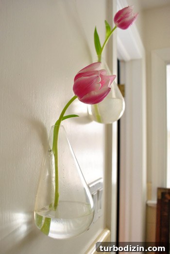 Floating Wall Vases: Stylish Mounted Flower Holders for Home Decor 6 Mirror leaning against wall in bathroom