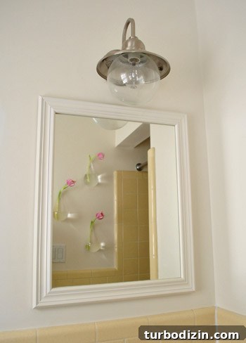 Floating Wall Vases: Stylish Mounted Flower Holders for Home Decor 7 Author posing in bathroom