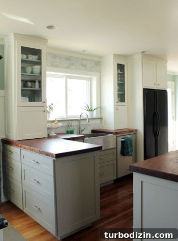 Glass-Front Cabinets, Wood Counters & Marble Backsplash Kitchen 7 Finished kitchen detail