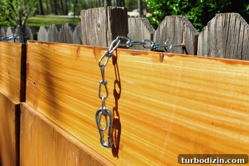 Safety chain and hook for sandbox cover