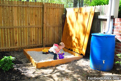 Child enjoying sandbox