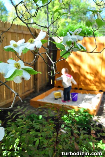 Child digging in sandbox
