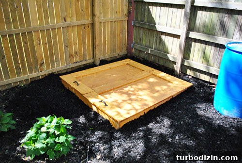 How to Build a DIY Rock Box for Portable Music Playback 10 Mulch around rock sandbox