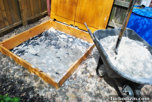 How to Build a DIY Rock Box for Portable Music Playback 5 Empty sandbox after removing sand