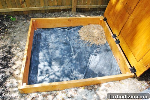 How to Build a DIY Rock Box for Portable Music Playback 6 Adding pebbles to sandbox