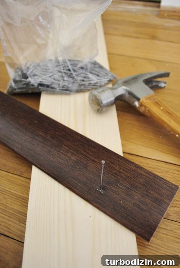 How to Install Floor Trim, Transition Strips, and Reducers 8 Securing transition with nails