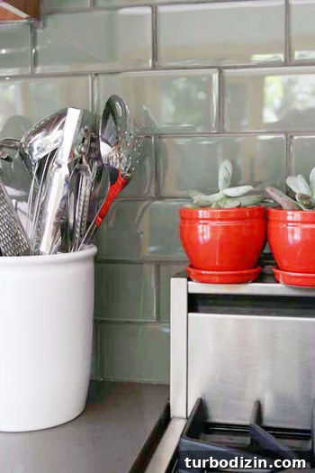 Sage Green Tile Kitchen with Warm Wood Cabinets 5 Kitchen design details